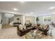 Spacious finished basement with a cozy seating area and ample natural light at 2566 Maple Creek Dr, Westfield, IN 46074