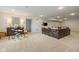 Finished basement with a seating area, drum set, and ping pong table, great for entertainment at 2566 Maple Creek Dr, Westfield, IN 46074