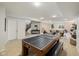 Spacious finished basement with a ping pong table, perfect for recreation and relaxation at 2566 Maple Creek Dr, Westfield, IN 46074