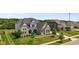 Lovely two-story home with manicured lawn and a classic architectural design at 2566 Maple Creek Dr, Westfield, IN 46074