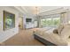 Sun-filled main bedroom with coffered ceiling, decor, and ensuite bathroom entrance at 2566 Maple Creek Dr, Westfield, IN 46074