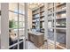 Stylish office featuring custom built-ins, a wooden desk, and ample natural light at 2566 Maple Creek Dr, Westfield, IN 46074