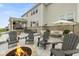 An outdoor patio area shows a fire pit and seating, perfect for entertaining guests and relaxing by a warm fire at 2566 Maple Creek Dr, Westfield, IN 46074