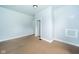 Bedroom featuring hardwood floors and neutral wall color at 2627 Chase St, Anderson, IN 46016