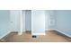 Bedroom featuring hardwood floors and ample closet space at 2627 Chase St, Anderson, IN 46016