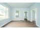 Open living area featuring hardwood floors and lots of natural light at 2627 Chase St, Anderson, IN 46016