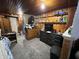 Bedroom with closet, dresser, TV, shelves, and carpeted floor at 2731 Delaware St, Anderson, IN 46016