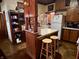 Kitchen with a breakfast bar and stools, seamlessly connecting to the living spaces at 2731 Delaware St, Anderson, IN 46016
