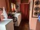Convenient laundry room with washer, dryer, and freezer at 2731 Delaware St, Anderson, IN 46016