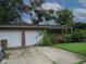 Charming brick home with a two-car garage and ample driveway space at 3103 Westenedge Dr, Columbus, IN 47203