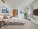 Serene bedroom with a large bed, neutral tones, and artwork at 32 W Northeast Ct, Shelbyville, IN 46176