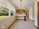 Bright breakfast nook features a large window that allows natural light to flow into the space at 32 W Northeast Ct, Shelbyville, IN 46176