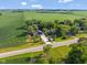 Picturesque aerial view showcasing a home with verdant fields in the background at 3777 W State Road 234, McCordsville, IN 46055