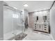 Bright bathroom featuring marble floors, a glass shower, and dual vanity with vessel sinks at 3777 W State Road 234, McCordsville, IN 46055