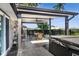Deck area featuring a hot tub and dining space with a ceiling fan at 3777 W State Road 234, McCordsville, IN 46055