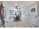 Cozy dining room with natural light, a ceiling fan, and marble floors at 3777 W State Road 234, McCordsville, IN 46055