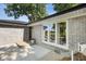 Covered entryway featuring brick siding, large windows, and a bench at 3777 W State Road 234, McCordsville, IN 46055
