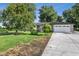 Beautiful home with a brick exterior, a two-car garage, a well-manicured lawn, and mature trees at 3777 W State Road 234, McCordsville, IN 46055