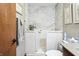 Bathroom with accessible walk-in tub and a marble-look shower surround at 3784 Mansfield Dr, Brownsburg, IN 46112