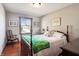 Cozy bedroom with hardwood floors, natural light, and comfortable furnishings, offering a peaceful retreat at 3784 Mansfield Dr, Brownsburg, IN 46112