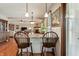 Cozy breakfast nook with counter seating, perfect for enjoying casual meals overlooking the living area at 3784 Mansfield Dr, Brownsburg, IN 46112