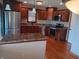 Eat-in kitchen featuring stone countertops and stainless steel appliances at 3784 Mansfield Dr, Brownsburg, IN 46112