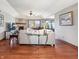 Comfortable living room with vaulted ceilings, fireplace, and large windows providing natural light at 3784 Mansfield Dr, Brownsburg, IN 46112