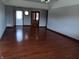 Open living room featuring hardwood floors and lots of natural light at 3784 Mansfield Dr, Brownsburg, IN 46112