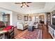 Spacious living room with hardwood floors, a cozy sectional sofa, and a decorative rug at 3784 Mansfield Dr, Brownsburg, IN 46112