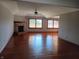 Spacious living room featuring a fireplace and hardwood floors at 3784 Mansfield Dr, Brownsburg, IN 46112