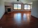 Spacious living room featuring a fireplace and hardwood floors at 3784 Mansfield Dr, Brownsburg, IN 46112