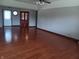 Open living room featuring hardwood floors and lots of natural light at 3784 Mansfield Dr, Brownsburg, IN 46112