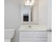 Bathroom with a white vanity, silver framed mirror, and a toilet at 4150 Huntsman Dr, Zionsville, IN 46077