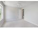 Bright and airy carpeted bedroom with neutral walls and a large window at 4150 Huntsman Dr, Zionsville, IN 46077