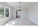 Spacious dining room with hardwood floors visible, featuring lots of light at 4150 Huntsman Dr, Zionsville, IN 46077