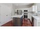 Bright kitchen with stainless steel appliances, granite countertops, and island at 4150 Huntsman Dr, Zionsville, IN 46077
