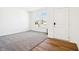 Bright bedroom featuring plush carpeting, white walls, and a view of the neighborhood at 430 Louisiana Dr, Pittsboro, IN 46167