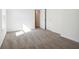 Spacious bedroom with soft carpet, neutral walls, and ample natural light from the window at 430 Louisiana Dr, Pittsboro, IN 46167