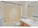 Bathroom featuring a vanity, a toilet, and a shower combination with light neutral tones at 5541 Lippan Way, Indianapolis, IN 46221