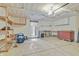 Spacious unfinished garage with overhead lighting and ample room for storage and projects at 5541 Lippan Way, Indianapolis, IN 46221