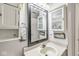 Bathroom featuring a framed mirror, storage cabinets, and an elongated oval sink at 5865 Pennekamp Dr, Plainfield, IN 46168