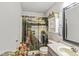 Cozy bathroom featuring a themed shower curtain, decorative accents and neutral color palette at 5865 Pennekamp Dr, Plainfield, IN 46168
