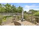 Wooden deck with a seating area, grill, and views of the private backyard at 5865 Pennekamp Dr, Plainfield, IN 46168
