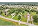 An aerial view showcases the property's location in a peaceful neighborhood at 6349 S Harding St, Indianapolis, IN 46217