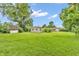 A large backyard with a shed and a detached garage at 6349 S Harding St, Indianapolis, IN 46217