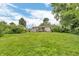 A single-story home with a large backyard at 6349 S Harding St, Indianapolis, IN 46217