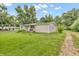A single-story home with a front porch and a well-manicured lawn at 6349 S Harding St, Indianapolis, IN 46217