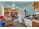 Open kitchen area with essential appliances and adjacent dining space at 6349 S Harding St, Indianapolis, IN 46217