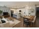 Open-concept living space featuring a kitchen with modern appliances and a dining area perfect for entertaining at 9215 Hawley Dr, Indianapolis, IN 46216
