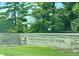 Fort Harrison State Park sign surrounded by lush green trees and well manicured grounds at 9215 Hawley Dr, Indianapolis, IN 46216